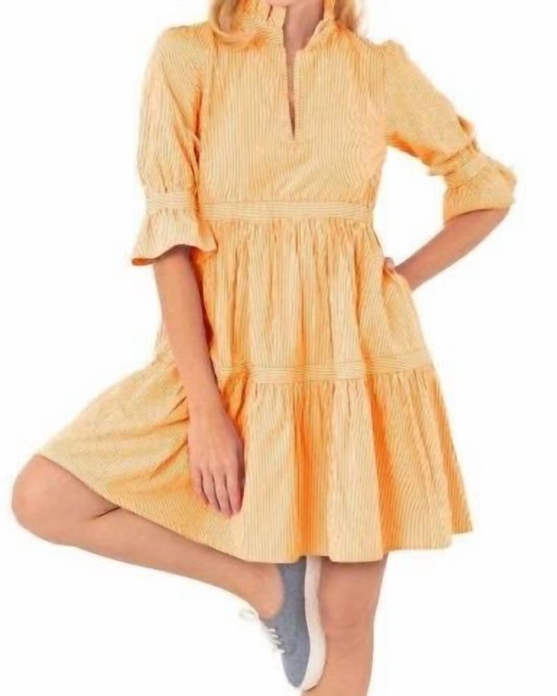 Front of a model wearing a size L Teardrop Dress - Stripe Wash & Wear In Orange in Orange by GRETCHEN SCOTT. | dia_product_style_image_id:342192